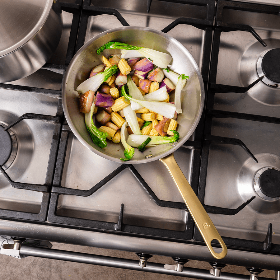 Batterie de cuisine en inox avec manches dorés, 9 pièces