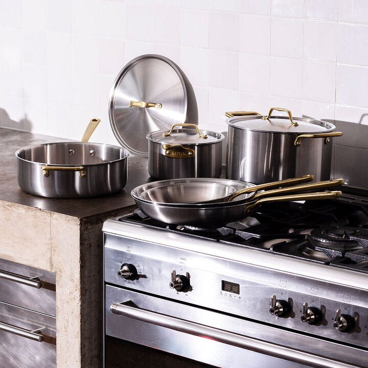 Batterie de cuisine en inox avec manches dorés, 7 pièces