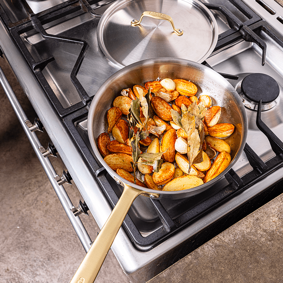 Batterie de cuisine en inox avec manches dorés, 7 pièces