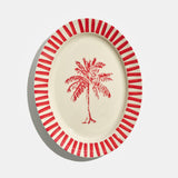 Le plat de présentation, en rouge carmin