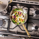 The Wok en inox, manche doré - 24 cm