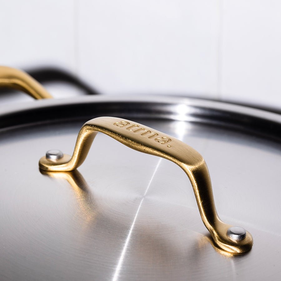 La sauteuse idéale en inox, manche doré - 26 cm