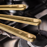 La sauteuse idéale en inox, manche doré - 26 cm